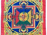 a close up of a red and blue cloth with a design on it