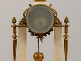 a clock that is sitting on top of a table