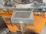 a machine that is sitting on the ground in the yard