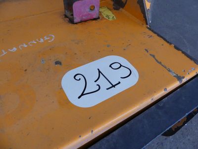 a number plate on the back of a tractor