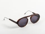 a close up of a pair of sunglasses on a white background