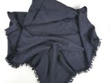 an image of a black scarf with fringes on it