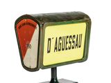 a sign that says daguessau on it on a stand