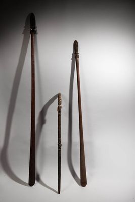 three different types of baseball bats on a white background