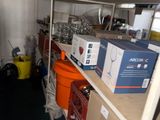 a room with a lot of boxes and boxes on the shelves