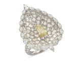 a close up of a diamond ring on a white background