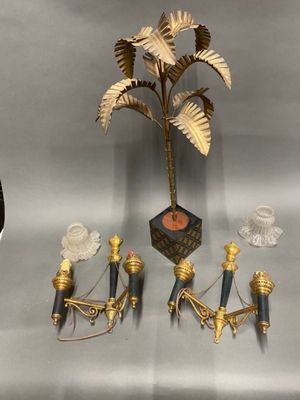 a small palm tree and other items that are on a table
