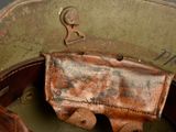a brown leather hat with a brown leather belt