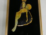 painting of a woman sitting on a rock in a gold frame