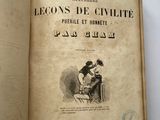 an open book with a picture of a man and a woman sitting on a chair