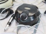 an image of a hair dryer and other electrical equipment on a table