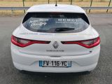 a white car with a sticker on the back of it