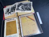several old baseball cards are on top of a table