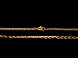 a gold chain on a black background