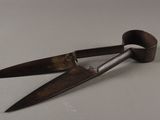 a pair of scissors that are on a table