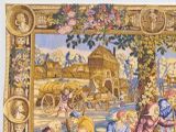 a picture of a tapestry with a picture of people in it
