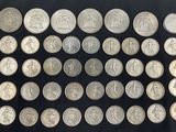 a collection of silver coins from the british empire