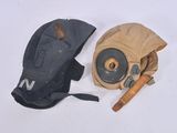 a glove and a gas mask on a white surface