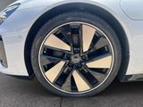 a close up view of a car ' s wheels and rims