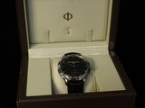 a watch that is in a box on a table