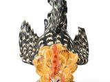 a figurine of a rooster with a turkey on it ' s back