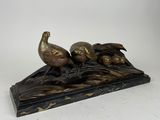 faisans en bronze ancien sur un socle en marbre