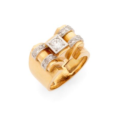 une bague en or jaune 18k et diamants