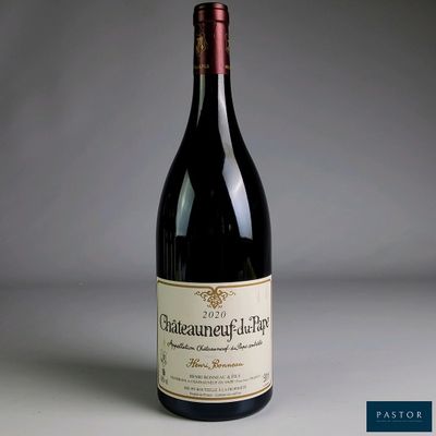 a bottle of wine that is sitting on a table