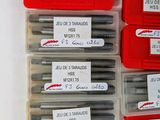 many different types of screws in a red case