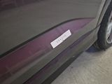 a car with a sticker on the side of it