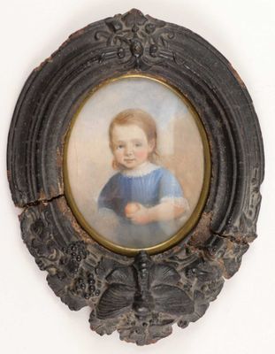 portrait of a young girl in a blue dress in a black frame