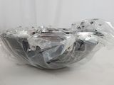 a plastic bowl that is wrapped in plastic and sitting on a table