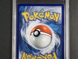 a close up of a pokemon card on a table