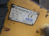 a sign on the back of a tractor that says miller