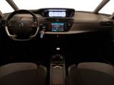 the interior of a car with a steering wheel and dashboard