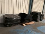 a pile of black plastic bags sitting on the floor