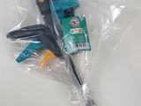 a pair of scissors in a plastic bag on a table