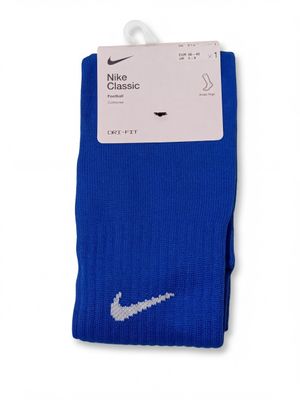 a pair of blue socks with the nike classic logo on them