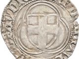 a close up of a coin with a cross on it
