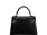 a black handbag on a white background