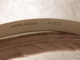a close up of a chair with a name on it