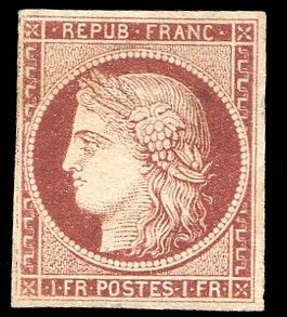a stamp with a woman ' s head on it