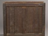 an old wooden chest with two doors and two drawers