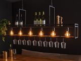 a wooden table with wine glasses hanging from it
