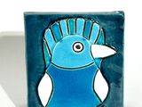painting of a blue bird on a blue background with a white background