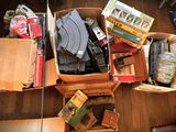 many boxes of assorted items sitting on the floor