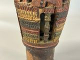 an image of a vase with a man and a woman on it