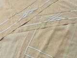a close up of a piece of cloth with a design on it