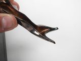 a person holding a pair of scissors in their hand