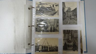 an old photo album with pictures of people in a boat